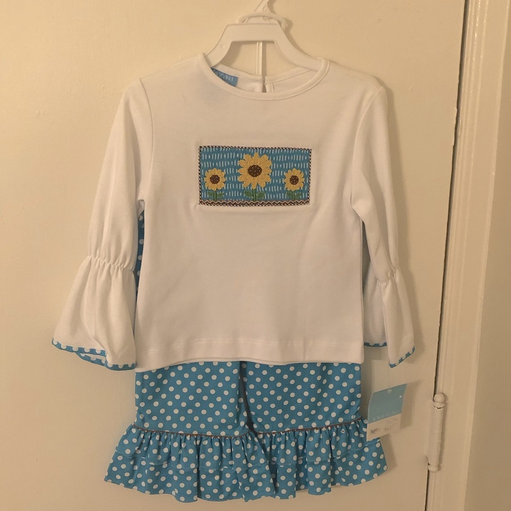 NWT girls 2T hand smocked sunflower top and pants.